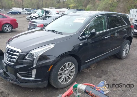 2017 Cadillac Xt5 Luxury from USA, damaged, VIN 1GYKNDRS5HZ111943